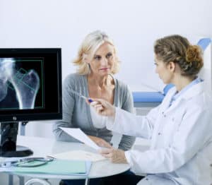 Technologist discussing Bone Density exam with patient